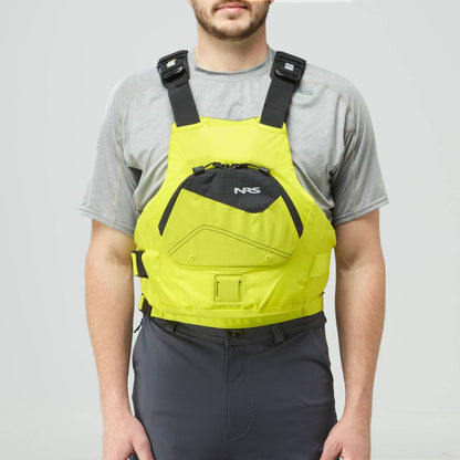 A person wears a yellow NRS Ion PFD over a gray t-shirt and dark gray pants, shown from the waist up against a plain background.