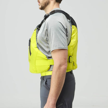 Side view of a man in a gray t-shirt, dark gray pants, and the bright yellow NRS Ion PFD life jacket, standing against a plain light background.