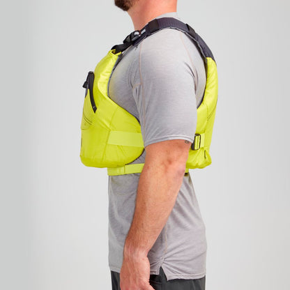 Wearing a gray shirt, the person confidently displays the NRS Ion PFD in profile. Crafted with ultra-soft foam for comfort and featuring the innovative Cool Flow System, this vibrant yellow Type III life vest offers safety and style against a plain backdrop.