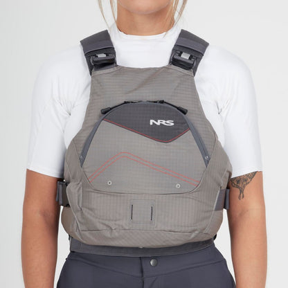Someone is wearing the NRS Ion PFD over a white shirt, featuring ultra-soft foam for comfort. It has black straps, a front pocket, and is gray in color.
