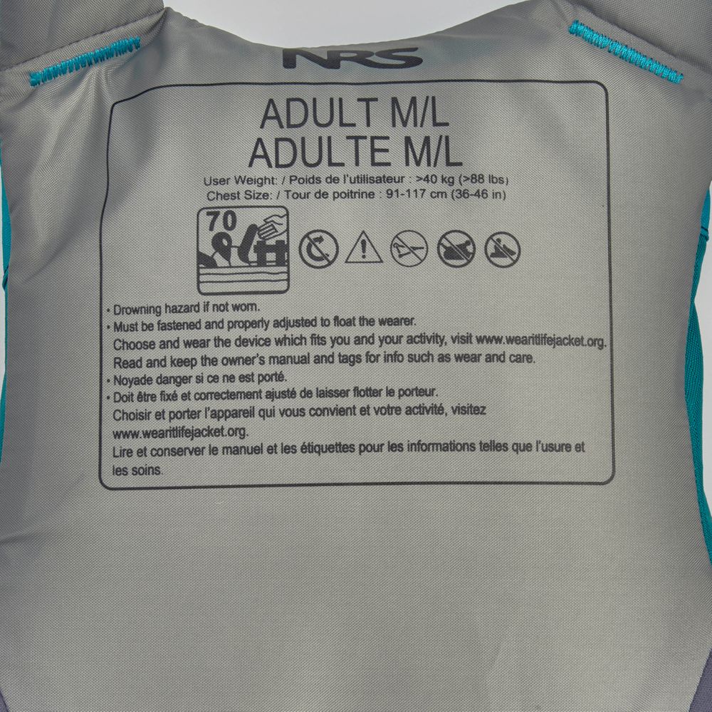 Close-up of a low-profile life jacket label for the NRS Ion PFD, displaying Adult M/L size, chest 91-117 cm, user weight over 40 kg, US Coast Guard certified, safety instructions, and website details.