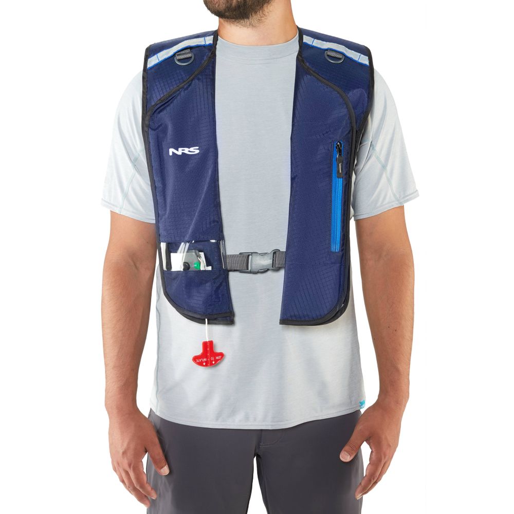 A man wearing an NRS Matik Inflatable PFD over a light gray shirt.