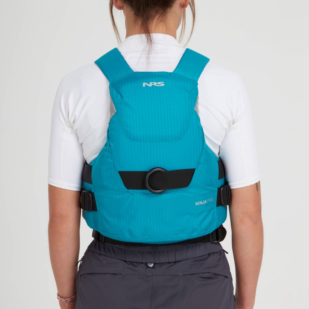 An individual in a white shirt wears the NRS Ninja Pro PFD, shown from the back against a plain background—the perfect rescue vest for whitewater paddlers seeking NRS’s trusted performance.