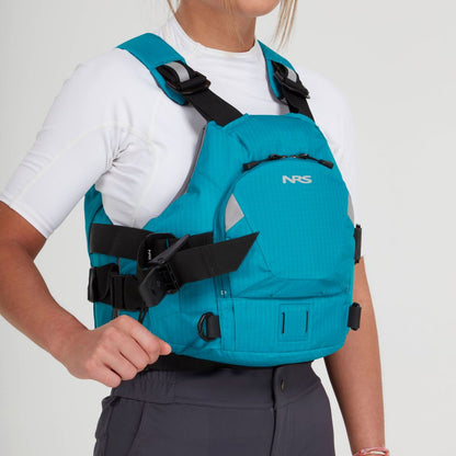 A person models the NRS Ninja Pro PFD in teal over a white shirt and dark pants, shown from shoulders to waist against a plain background—perfect for whitewater paddlers seeking a premium rescue vest.
