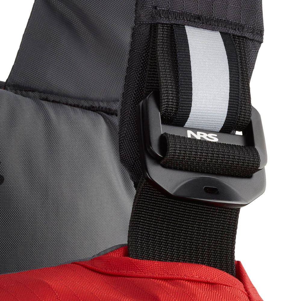 Close-up of a black strap with reflective stripe and buckle attached to red and gray fabric, featuring the NRS logo—this detail is from the NRS Ninja Pro PFD rescue vest.