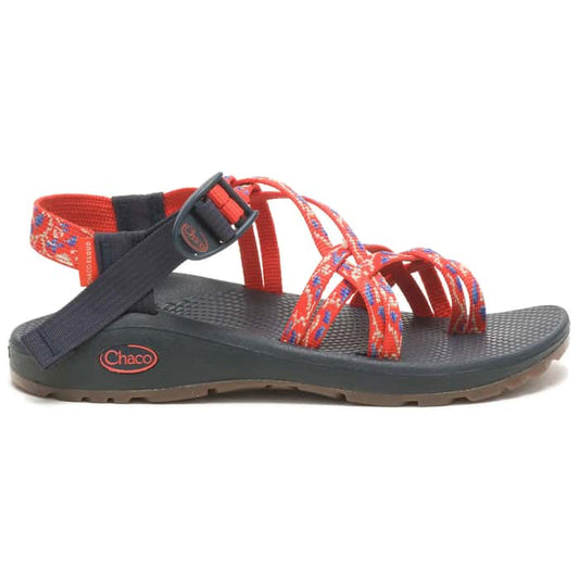 A side profile view of the Chaco ZCLOUD X2 women's sandal with a black LUVSEAT footbed, adjustable red and blue patterned straps, and a red buckle.