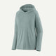 The Patagonia Cap Cool Daily Hoody - Womens is a light green, long-sleeve technical hoody with a relaxed fit, made from recycled polyester for better moisture evaporation, shown on a plain light background.