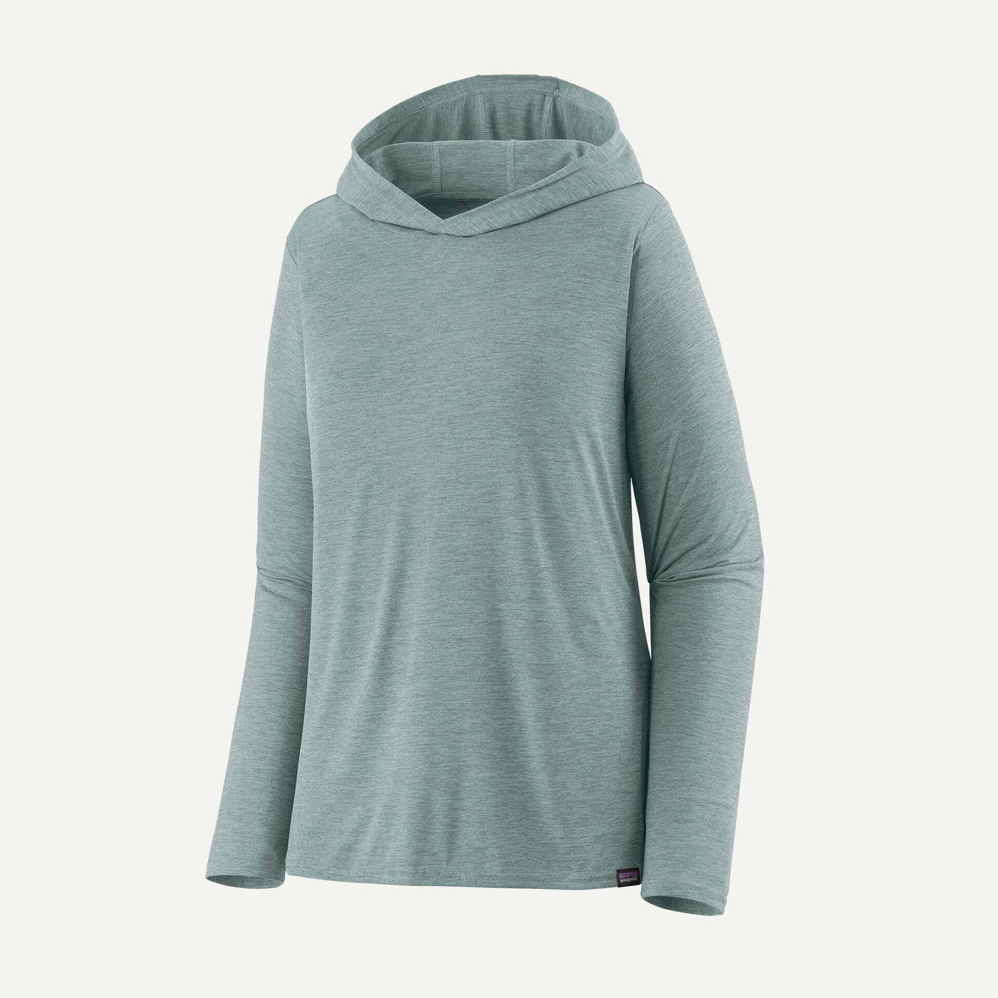 The Patagonia Cap Cool Daily Hoody - Womens is a light green, long-sleeve technical hoody with a relaxed fit, made from recycled polyester for better moisture evaporation, shown on a plain light background.
