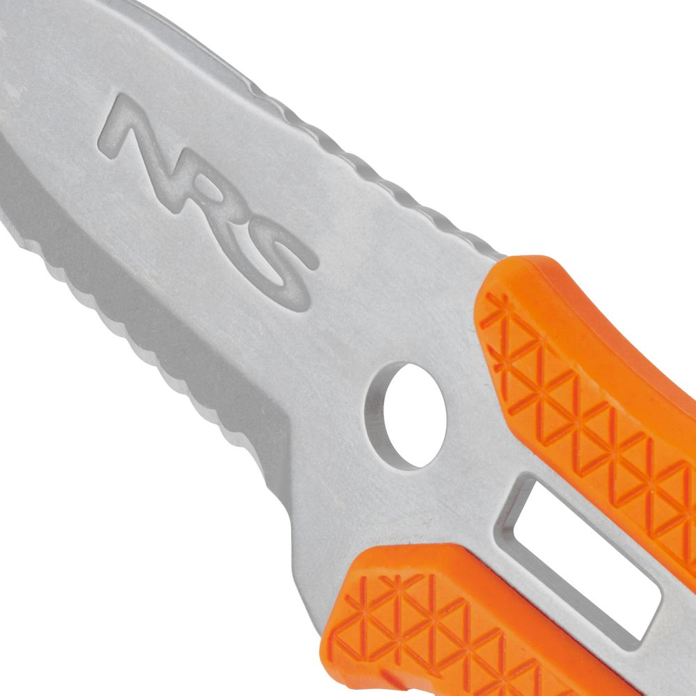 Close-up of a partially serrated Co-Pilot Knife blade by NRS, with an orange textured handle and "NRS" engraved on the metal. This rescue design integrates seamlessly with PFDs, ensuring safety and functionality in emergencies.