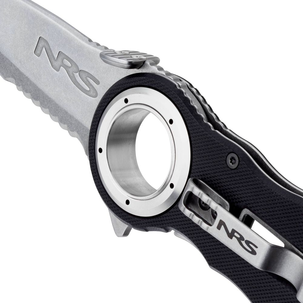 Close-up of a Pilot Access Knife with a circular cutout in the handle, partially serrated edge, and "NRS" etched on both the stainless steel blade and handle.