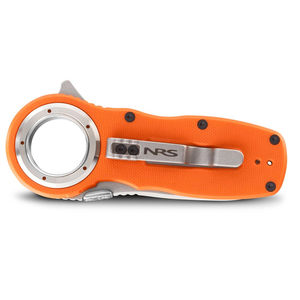 The NRS Pilot Access Knife features an orange textured handle, a stainless steel serrated blade with circular guard, and the "NRS" logo. It includes a belt clip and safety locking mechanism for reliability.