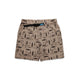 The Kavu Chilli H20 Shorts are tan hybrid walk shorts with an all-over black surfboard and paddle print, made from quick-dry fabric. They feature an adjustable waistband with a black buckle and side pockets.