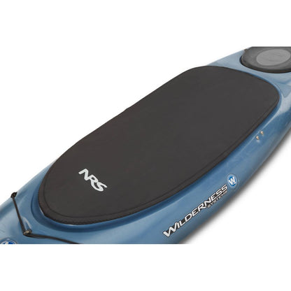 A blue kayak with a black NRS Super Stretch Cockpit Cover on top features "Wilderness" elegantly written on its side. The cover offers durable protection and is equipped with an adjustable shock cord for a secure fit.
