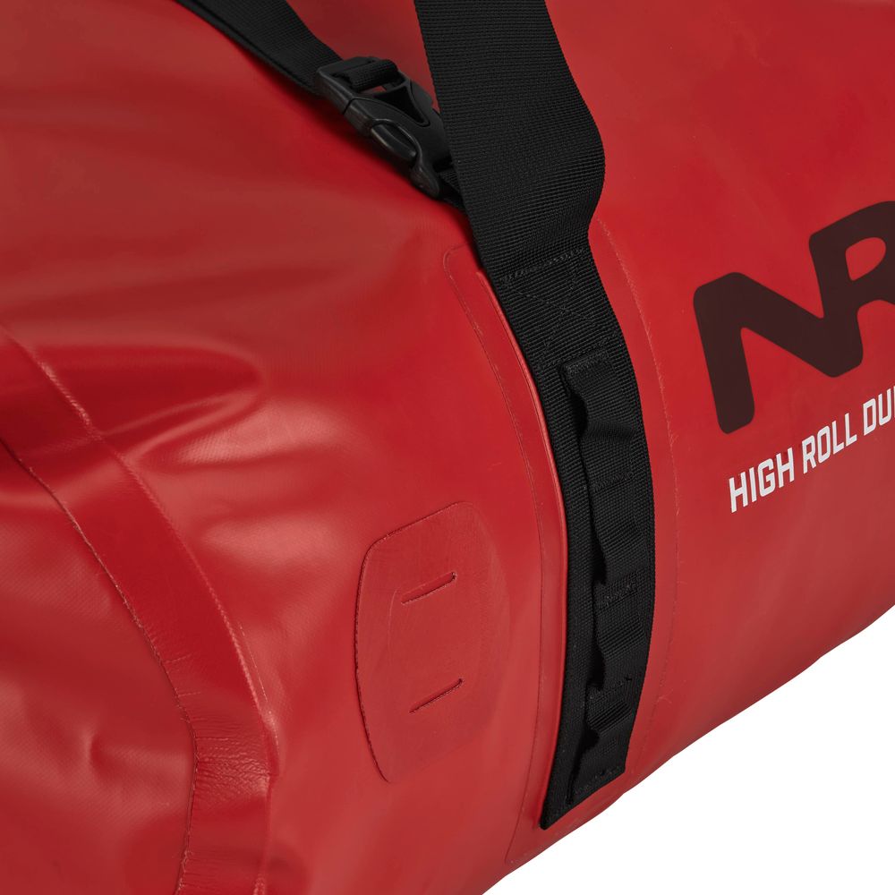 Close-up of a red NRS High Roll Duffel Dry Bag with black straps, featuring the text "HIGH ROLL DUFFLE" on the side. Made from PVC-Free TobaTex, this eco-friendly dry bag offers durable water resistance for your gear.