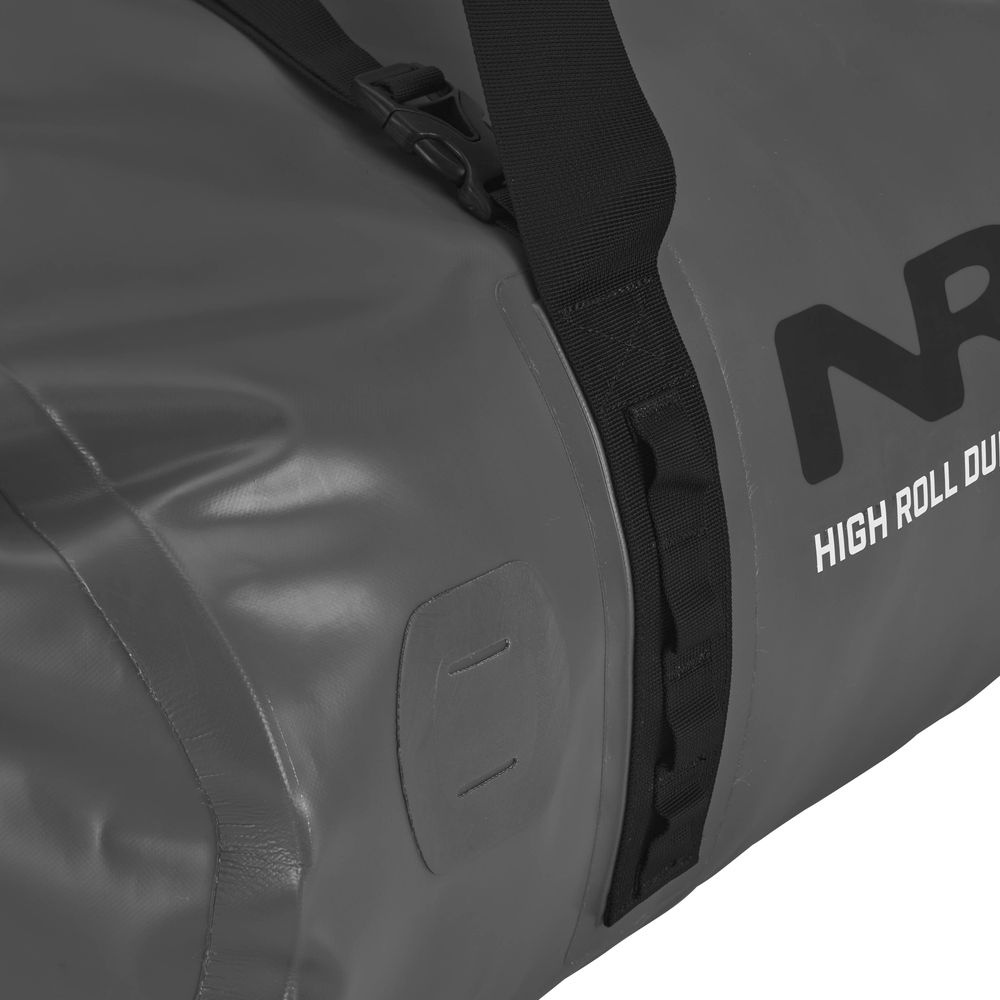The NRS High Roll Duffel Dry Bag is a gray, waterproof bag made from PVC-Free TobaTex with black straps and "High Roll Duffel" on the side. Its StormStrip™ closure keeps your belongings safe in any weather.