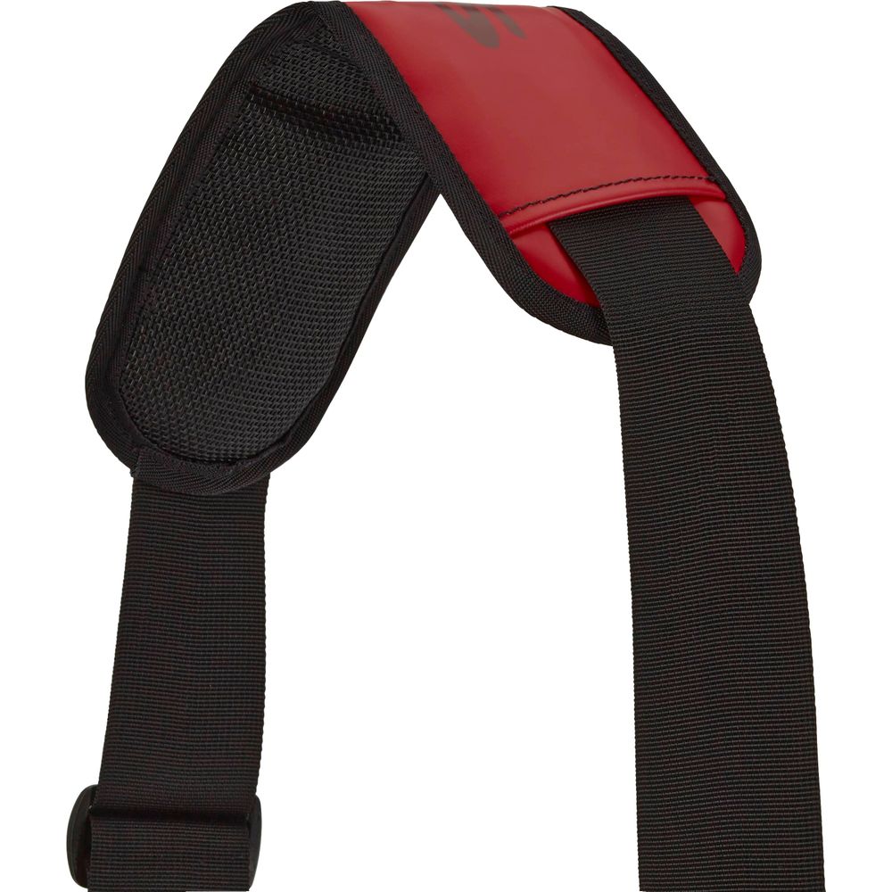 A close-up of the Expedition DriDuffel's black and red adjustable shoulder strap, featuring padded sections and crafted from PVC-free material by NRS.