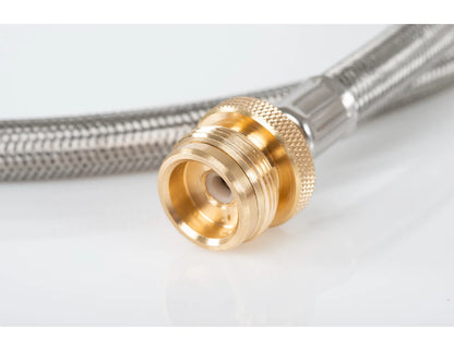 Close-up of a GSI Outdoors Propane Adapter Hose featuring a brass hose fitting connected to a braided stainless steel hose on a white background.
