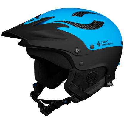 The Sweet Protection Rocker Helmet in blue and black features TLC Shell Technology, a visor, and a chin strap for optimal protection, making it perfect for intense conditions. Side view.