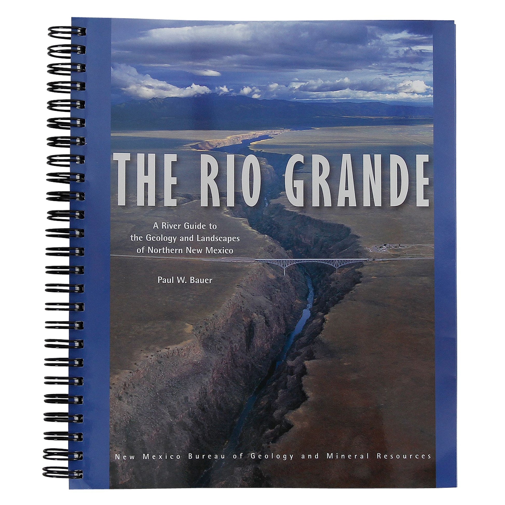 A spiral-bound book titled "Rio Grande River Guide to the Geology and Landscapes of Northern New Mexico" by Paul W. Bauer, with an aerial photograph of the Rio Grande on the cover, published by New Mexico Bureau of Geology & Mineral Resources.