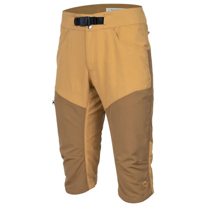 The Immersion Research Shinzer Shorts are tan and brown knee-length paddling shorts with front pockets, an adjustable webbing belt, and reinforced abrasion-resistant knee panels.