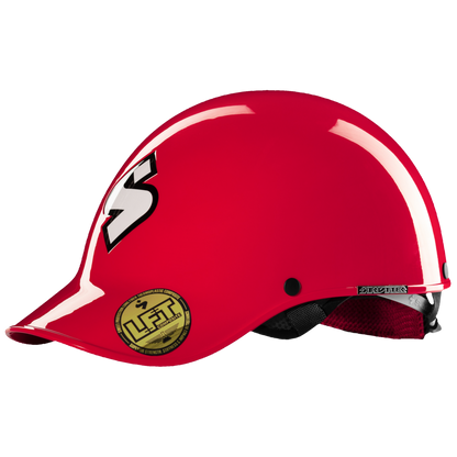 The Strutter Helmet by Sweet Protection is a red sports helmet with a white "S" logo on the side and a gold "Lift" sticker near the brim. Made with carbon fiber reinforced materials, it stands out against a white background, combining durability with sleek design elements.