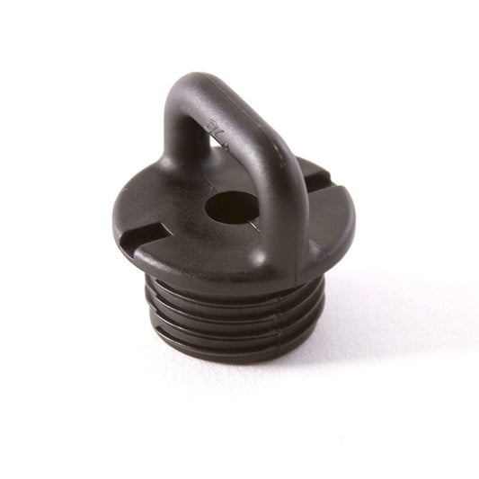 The Hobie Pad Eye XL, a black plastic accessory with a central handle and hole, designed for Hobie kayaks, is shown resting on a white surface.