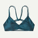 The Reversible Seaglass Bay Top by Patagonia for women features a teal design with double spaghetti straps and ruched front detail.
