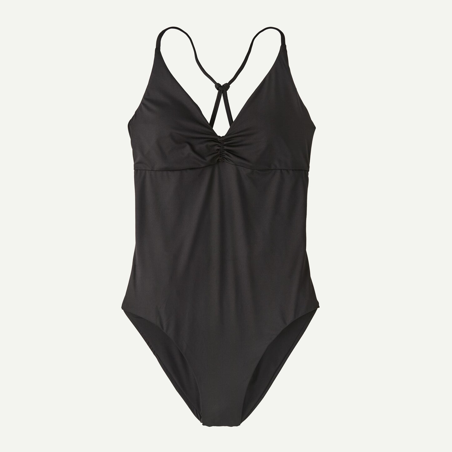 The Cross Shore One Piece by Patagonia, a black swimsuit featuring crisscross straps and chest gathering, is shown on a plain background.