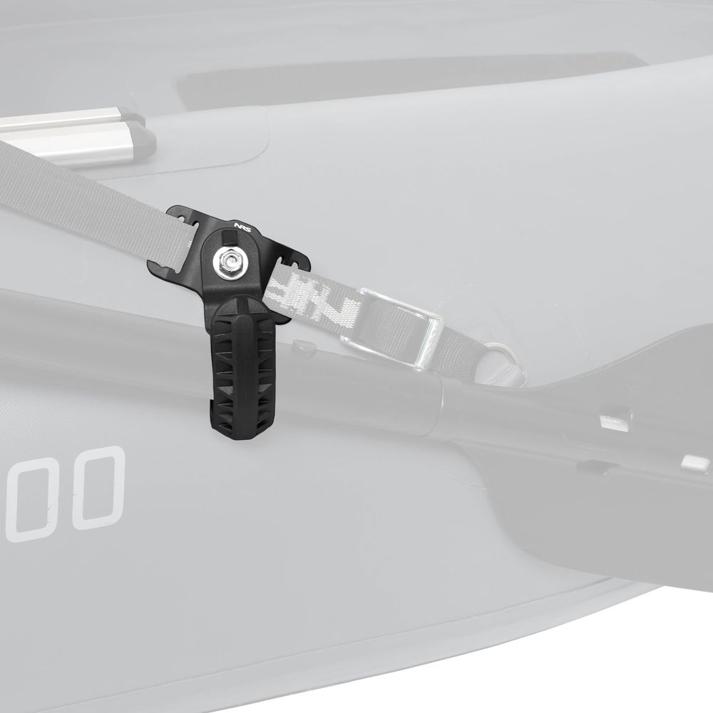 Close-up of the NRS Oar Rest securing a fabric strap and paddle to a gray kayak, highlighting a practical accessory designed to keep your gear securely in place.