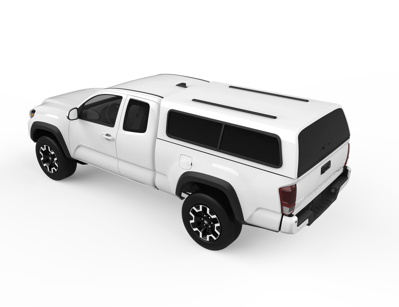 the back of a white Yakima HD Tracks w/CapNuts Toyota Tacoma.