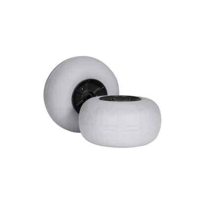 Shown against a plain black background are two 13" balloon wheels featuring white tires and black hubs, designed specifically for a kayak cart. These high-quality wheels are part of the Heavy Duty Kayak Cart by Wilderness Systems.