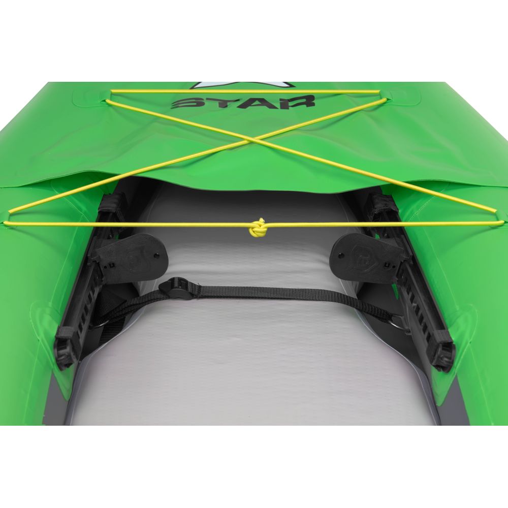 The STAR Paragon Tandem IK by NRS is a green inflatable kayak with yellow bungee cords across the bow, featuring a drop-stitch floor for added durability and black seat mountings inside.