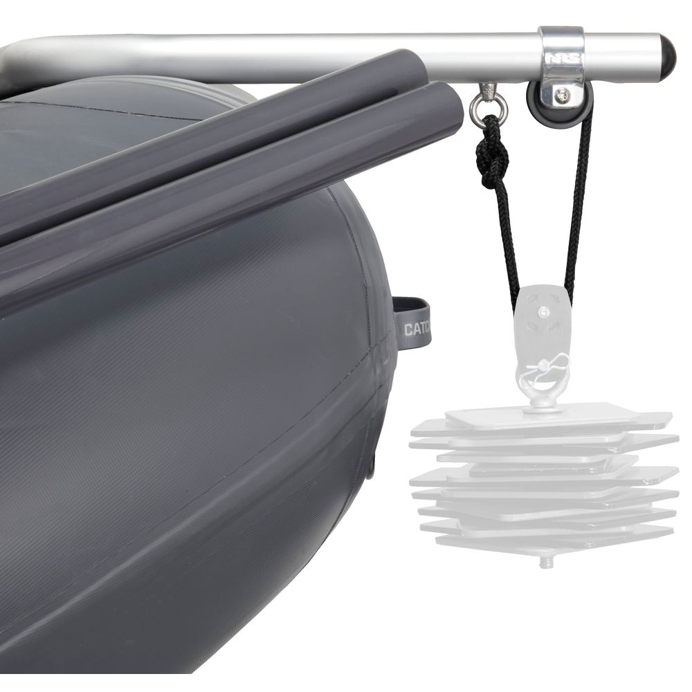 The Slipstream Fishing Raft by NRS features gray fenders, a metal rod, and a pulley system with stacked plastic plates for enhanced durability in whitewater. It's ideal for those seeking reliable shallow water performance.