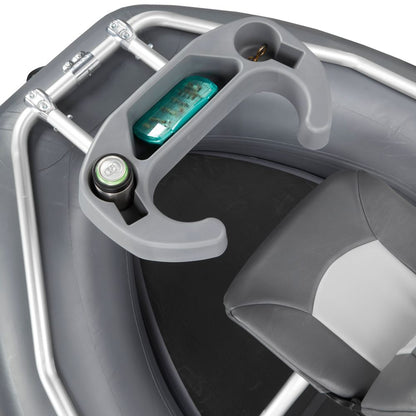 The NRS Slipstream Fishing Raft includes a grey plastic circular holder, engineered for durability, securely holding a drink can and small bottle. Mount it by the cushioned grey seat for optimal shallow water performance.