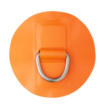 The NRS Star 1.3" PVC D-Ring is an orange round patch made for outdoor use, featuring a central silver D-ring, perfect for securing items on inflatable crafts.