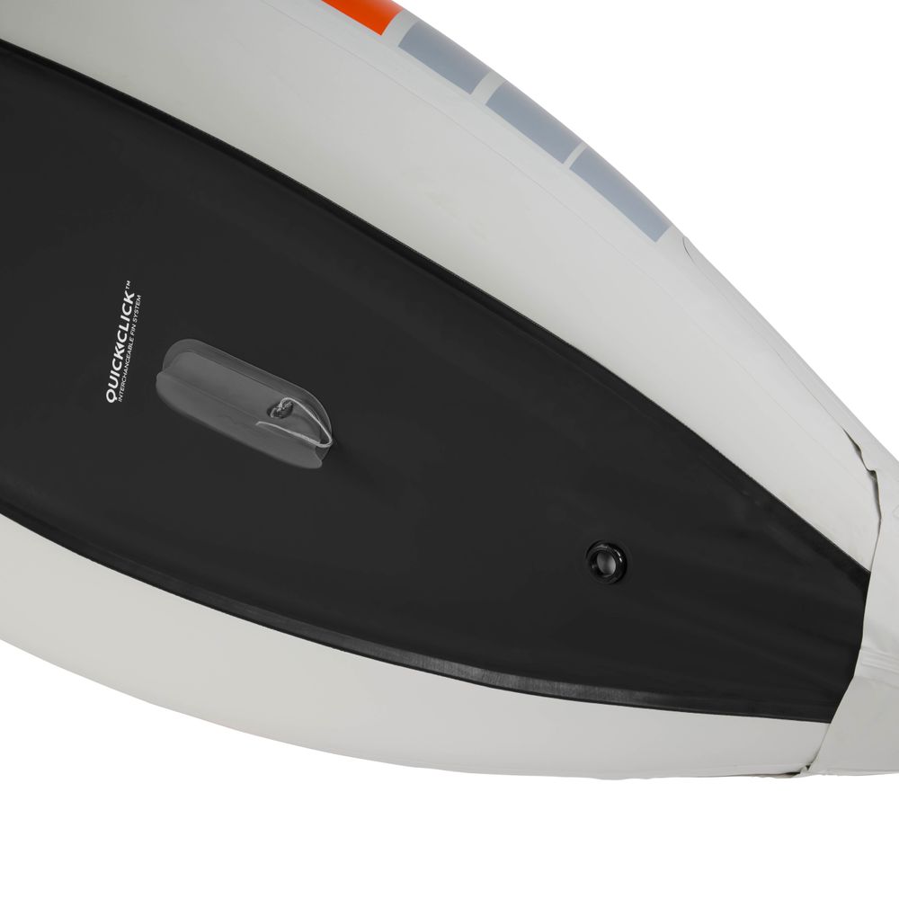 Close-up of the NRS Akamai 125 Inflatable Kayak's underside, featuring a gray fin on a black "QUICKCLICK™" section and part of the durable white PVC-free nylon hull.