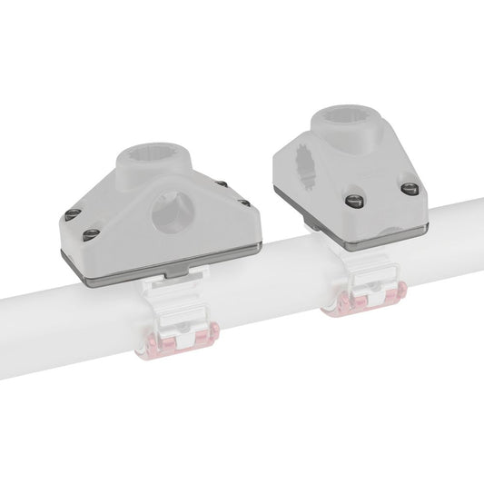 The ClampIt Utility Mount by NRS features two gray brackets on a white cylindrical rod, secured with fasteners, echoing the reliable design of RAM Bulkhead Flat/Surface Bases.
