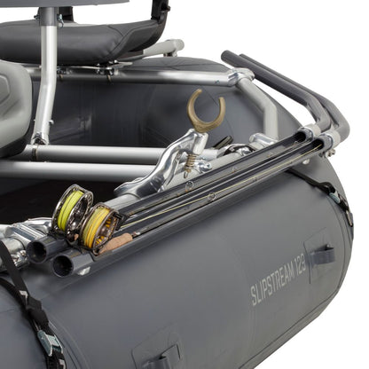 The Slipstream 12.9 inflatable boat, featuring aluminum alloy construction, includes built-in NRS Fishing Rod Holders on the side for securing fishing rods and reels.