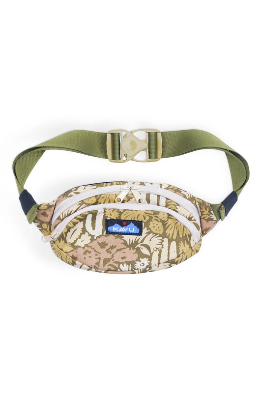 The Kavu Canvas Spectator is a beige and olive green patterned waist bag featuring two zippered compartments, an adjustable green strap, and a plastic buckle.