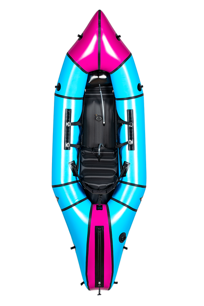 The Alpacka Mage inflatable kayak in blue and pink features a black seat and footrest, shown from above on a white background—perfect for advanced paddlers needing reliable whitewater performance.