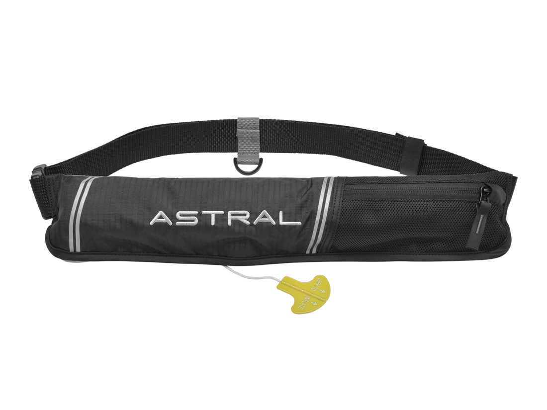 The Astral AirBelt 2.0 Inflatable PFD is a black waist pack adorned with the "Astral" logo, featuring a zippered compartment and a yellow pull tab, designed for flatwater SUPing adventures.