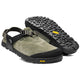 The Bedrock Mountain Clog is a green suede outdoor sandal with black adjustable straps and rugged Vibram soles, displayed in both side and bottom views.