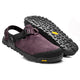 The Bedrock Mountain Clog is a pair of maroon suede sandals with black Vibram soles, adjustable heel straps, and a buckle, shown from the side and bottom views.