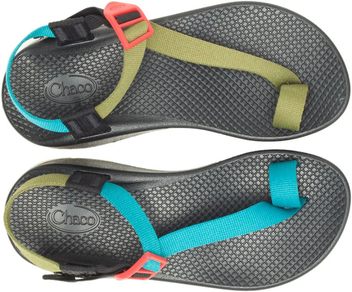 The Chaco Women's Bodhi Sandle features black soles, green and blue straps, and red buckles. Lightweight and comfortable, these sandals combine vibrant style with the trusted quality of Chaco.