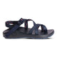 The Chaco Z2 Classic - Men's sandal features navy blue adjustable patterned straps, a supportive footbed, and a durable sole—shown in side profile to highlight its classic outdoor style.
