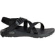 The Chaco Z1 Classic - Women's sandal in black features adjustable straps, a buckle, a textured footbed, and a rubber sole—shown in side profile and ideal for hiking or outdoor adventures.