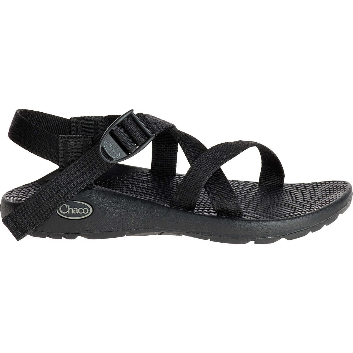 The Chaco Z1 Classic - Women's sandal in black features adjustable straps, a buckle, a textured footbed, and a rubber sole—shown in side profile and ideal for hiking or outdoor adventures.