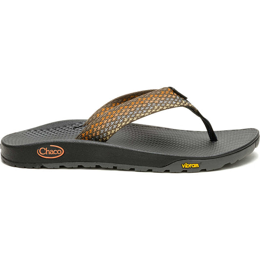 The Chaco Rapid Pro Flip Flop - Women's features black and gray colors, orange and brown patterned straps, Chaco and Vibram logos, plus a Vibram outsole for superior traction in water performance sandals.