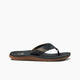 The REEF SANTA ANA sandal by REEF features a black and brown design, textured sole, high arch support, and a wide strap, displayed from the side on a white background.