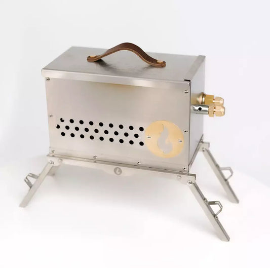 A VolCanNo Trident Combo camp stove with a wooden handle, perfect for campfire bans. (Brand: LavaBox)